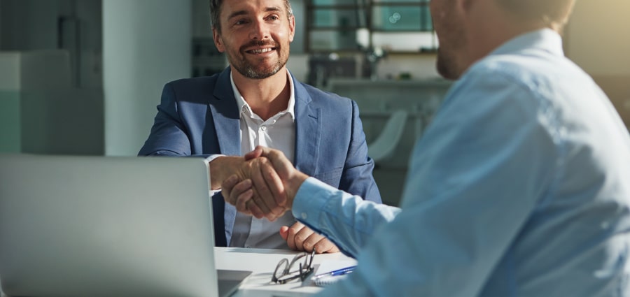 brokers shaking hands