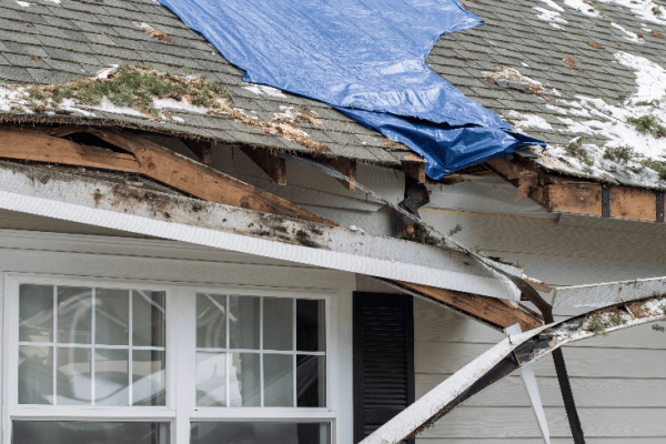 Roof damage from stormy weather.