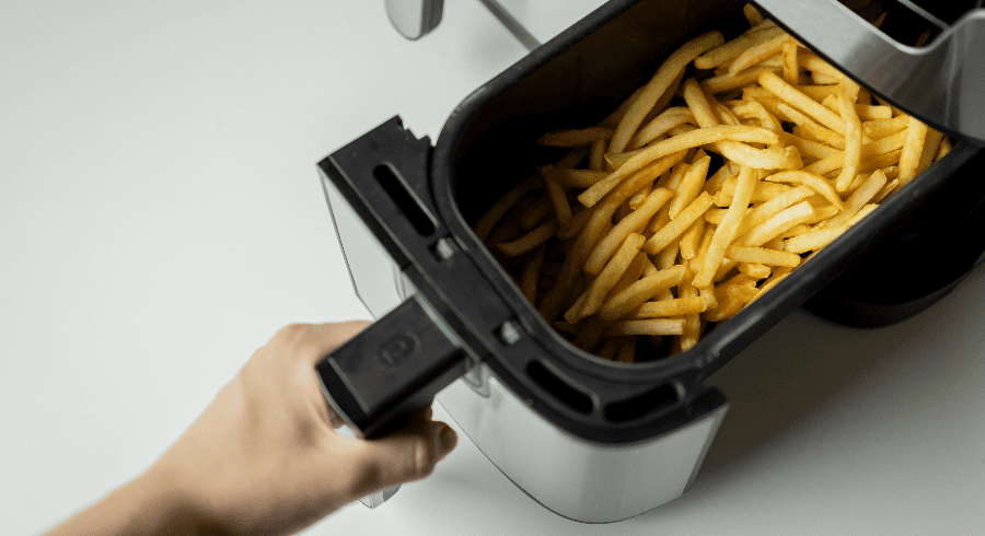 Person cooking with Air Fryer